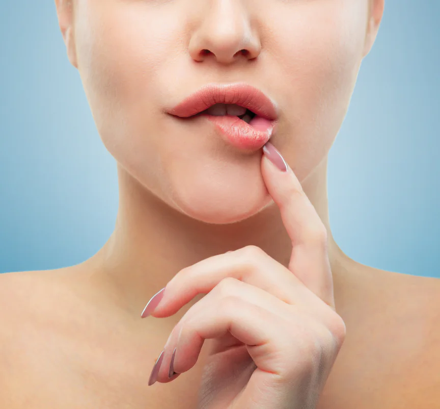 Woman touching her lips for the Geisinger Advanced Aesthetics case study