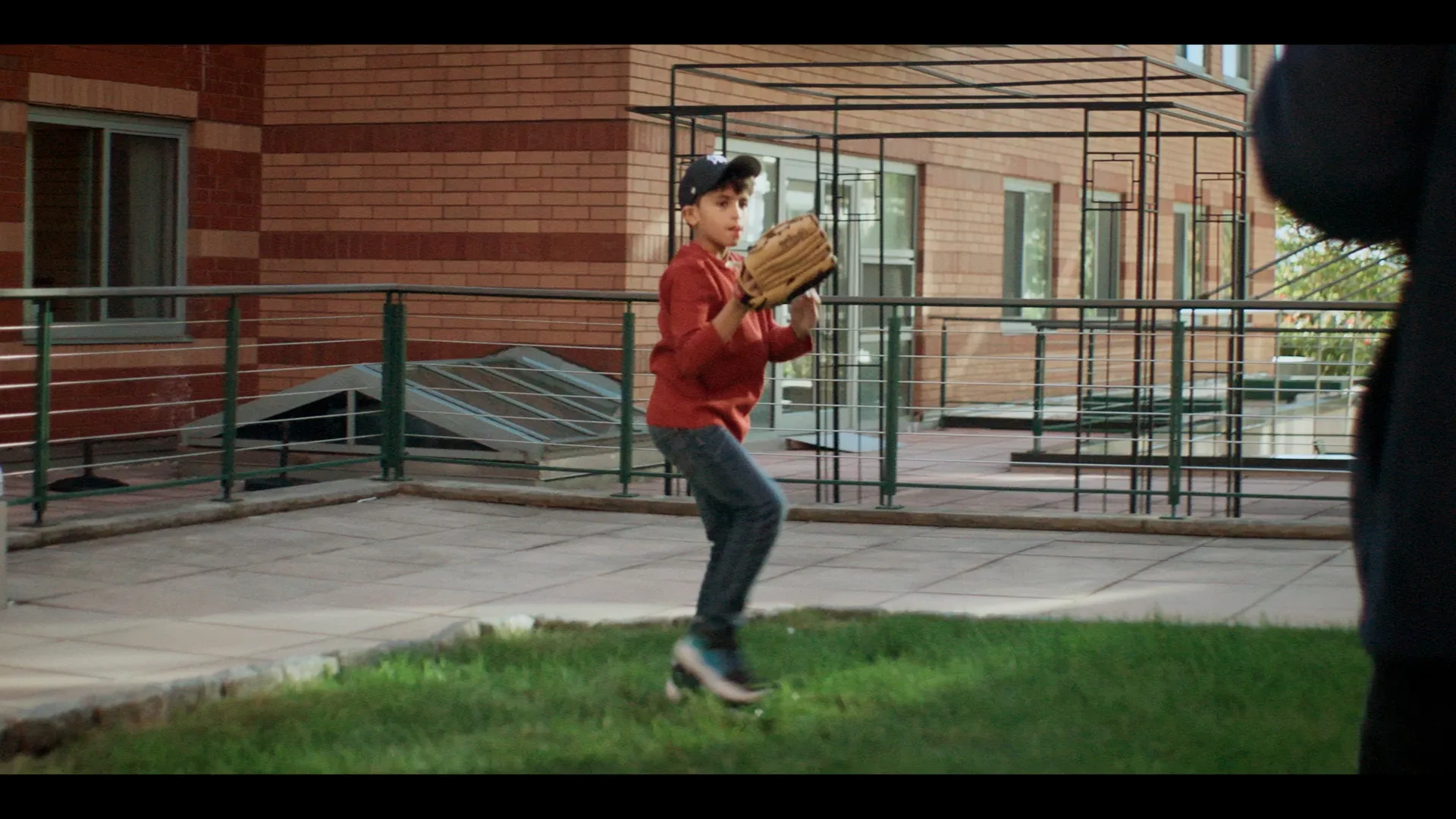 A young baseball player at RiverSpring Living